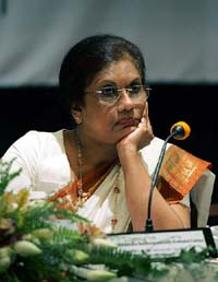 Sri Lanka's President Chandrika Kumaratunga listens to opening remarks by one of her ministers