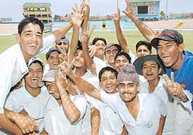 Members of the Chandigarh District team in a jubilant mood after defeating Jalandhar team in M.L Markan Cricket Trophy at PCA, Mohali