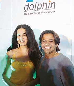 Bollywood actors Rukhsar and Rajpal Yadav pose at the launch of Funstation - the GPRS portal of Indias state-owned telecom company MTNL in Mumbai on Wednesday