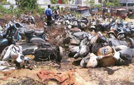 Damaged scooters in front of the office of the SP Traffic in Ludhiana which caught fire under mysterious circumstances 