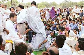 Congress MP Rahul Gandhi listens to the problems and grievances of the people at his Lok Sabha constituency of Amethi on Wednesday. 