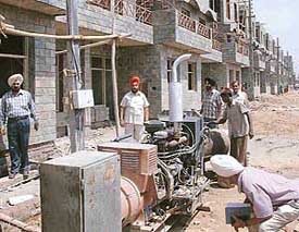 Sleuths of the Economic Offence wing of the Punjab Vigilance Bureau inspect a power generator set during a raid at Gulmohar Trends