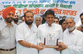 The secretary of the All-India Congress Committee, Mr Manish Tiwari, being honoured at a function in Ludhiana on Thursday