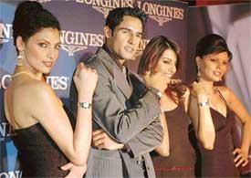 Models display a collection of watches in Ludhiana on Thursday