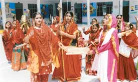 Students of Guru Gobind Singh Public School, present giddha on the inaugural day of the art and craft exhibition in Ludhiana on Thursday