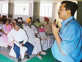 Dr Rajan Isaacs, senior nephrologist, Deepak Hospital, addresses a patient education programme in Ludhiana
