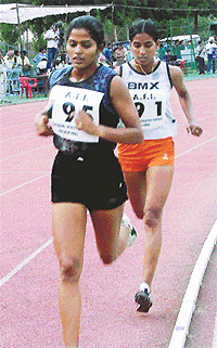 Asian Games gold medallist Sunita Rani races to victory ahead of Beant Kaur in the womens 10,000 m race during the AFI National Athletics Circuit Meet at the NIS ground in Patiala on Saturday