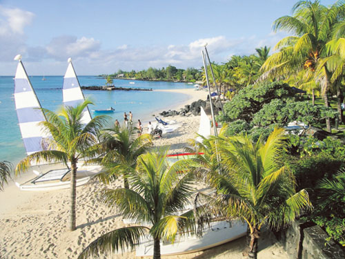 Unspoilt beaches and water sports attract many western tourists to Mauritius.