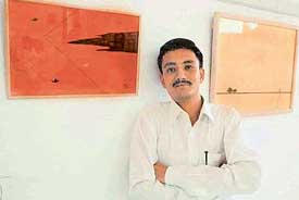 Shamsher Jaryal with his exhibits at Jodh Gallery in Chandigarh on Sunday