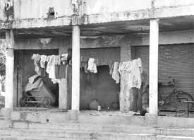 Beggars have taken over the unalloted booths in Mansa Devi Complex