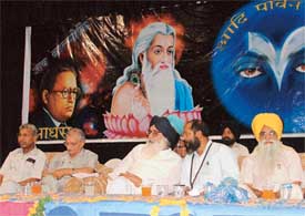 Former Chief Minister Parkash Singh Badal with leaders of the Adhi Dharam Samaj in Ludhiana on Sunday
