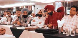 Dr S.C. Jain, president, with other participants at the general body meeting of the Northern India Homoeopathic Chemists Association in Ludhiana on Sunday