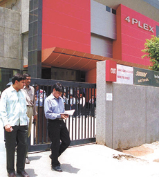 Delhi Police Special Cell officers coming out from Satyam Cinema after inspecting the explosion site. The Special Cell handles the series blast case, in the Capital on Monday.