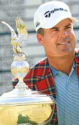 Kenny Perry with the Leonard Trophy after winning the Colonial Golf Tournament in Fort Worth, Texas, on Sunday
