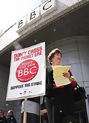 BBC workers picket outside the television centre in London on Monday