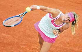 Second seed Maria Sharapova of Russia serves during her match against compatriot Evgenia Linetskaya