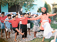 Inmates of Ananda Marga Ashram perform Tandava under the guidance of Acharya
