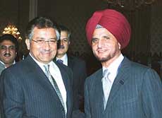 Pakistan President Pervez Musharraf with FICCI President Onkar S. Kanwar (right) at Presidents House in Islamabad on Wednesday. 