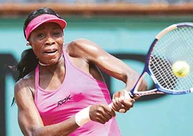 Venus Williams of the USA returns the ball to Fabiola Zuluaga of Colombia during their match in the second round of the French Open at Roland Garros on Wednesday. Williams won 6-3, 3-6, 6-3. 