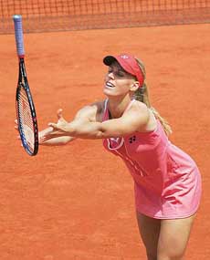 Elena Dementieva of Russia catches her racket during her match against Sanda Mamic of Croatia in the second round of the French Open at Roland Garros on Wednesday. Dementieva won 7-6(7), 6-2.