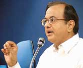 Finance Minister P. Chidambaram addresses a press conference after the Cabinet meeting in New Delhi on Thursday.