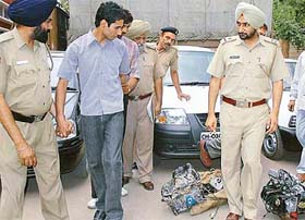 Gurjit Singh Chandokh, kingpin of an inter-state gang of car thieves, in police custody Chandigarh