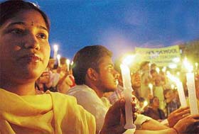 Government school contractual teachers hold a candlelight protest in Sector 17, Chandigarh