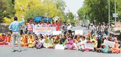 Students of various ITIs block the Rani Jhansi road in protest against the suspension of Principal Tejinder Singh