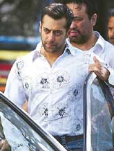 Bollywood star Salman Khan sits in his car as he leaves after appearing in a court in Mumbai on Thursday. Khan appeared in court in connection with a car accident that happened two and a half years ago.