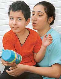 Shalini Bhandral with her daughter at her Sector 28 house in Chandigarh on Friday