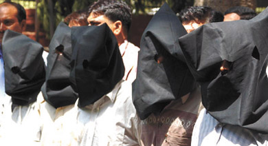 Five members of a desperate gang of robbers in the police net after a brief encounter in the Capital on Friday