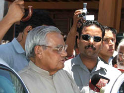 A former Prime Minister, Mr Atal Bihari Vajpayee, speaks to mediapersons on his arrival at the Bhuntar airport in Kulu on Friday.