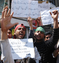 Activists of the Islamic Student League hold a protest in Srinagar on Friday. 