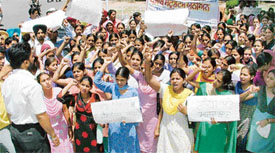 Students of the ITI, Ghumar Mandi, hold a protest rally against the suspension of the college Principal in Ludhiana on Friday