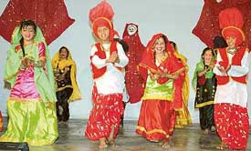 Students of DAV Public School perform during their foundation day function in Ambala