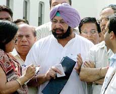 The Punjab Chief Minister, Capt Amarinder Singh, talks to mediapersons after returning from Canada at the Indira Gandhi International Airport in New Delhi