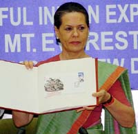 Congress President Sonia Gandhi releases the first day cover stamp in New Delhi on Sunday on the occasion of the 40th anniversary celebrations of the first successful Indian expedition to the Mount Everest.