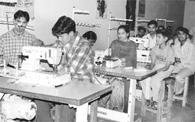 Students undergoing training in textile and knitwear technology.