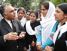 Education Minister listening to the demands of students during his visit to Government Women College