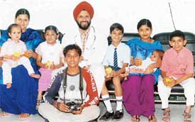 Dr H.S. Bedi with some of the kids who had undergone heart surgeries