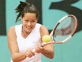 Ana Ivanovic of Serbia and Montenegro returns the ball to Francesca Schiavone of Italy during their match in the fourth round of the French Open at Roland Garros