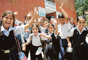 Students of Government Model High School, Sector 12, Chandigarh, rush out of the school on the last day before the start of summer vacation on Tuesday.