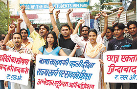 SC/ST students under the banner of Ambedkar Students Organisation demonstrating in front of Dean office against the price hike in admission form in the Capital on Tuesday