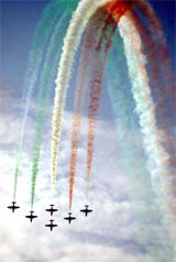 India's Suryakiran aircraft perform after the National Defence Academy's passing-out parade 
