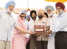 Patiala MP Preneet Kaur hands over the charge of TPD Malwa College to Punjabi University Vice-Chancellor S.S. Boparai at Rampura Phul on Tuesday.