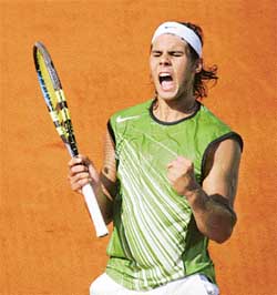 Rafael Nadal of Spain reacts during his quarterfinal match against compatriot David Ferrer in the French Open at Roland Garros on Tuesday