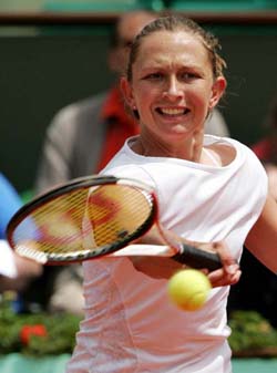 Elena Likhovtseva of Russia hits a forehand shot during her quarterfinal match against Sesil Karatantcheva of Bulgaria in the French Open at Roland Garros
