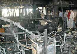 A team of forensic experts (CSFL team) inspects the site of fire in Sector 22 in Chandigarh in the wee hours on Wednesday.