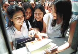 Students collect their admission forms at Kirori Mal College. 