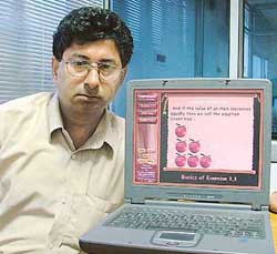 Mr Ashwani Sharma of HIM Computers, displays the maths software developed by his company. 